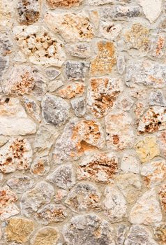 Rustic old stone wall texture background structure