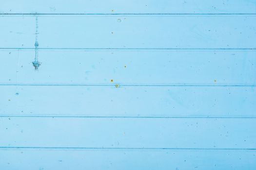Light blue painted wooden planks background texture with copy space
