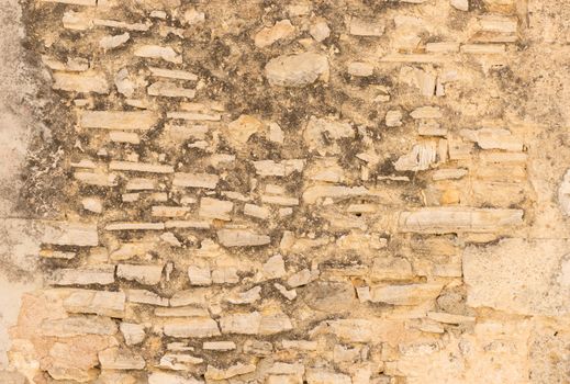 Ancient rustic grungy wall backdrop texture, close-up