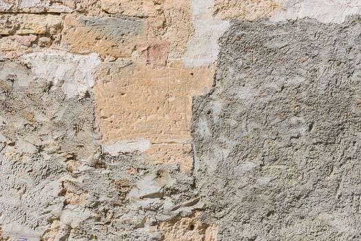 Vintage rustic gray damaged wall plaster backdrop texture, close-up

