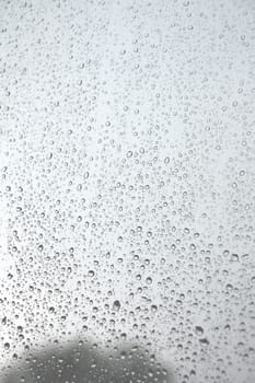 Drops of rain on the window (glass). Shallow DOF.