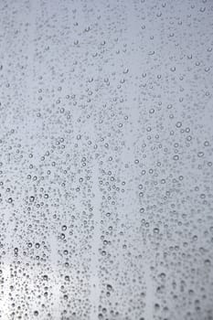 Drops of rain on the window (glass). Shallow DOF.