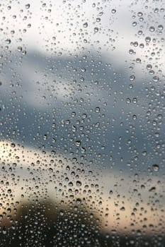 Drops of rain on the window (glass). Shallow DOF.