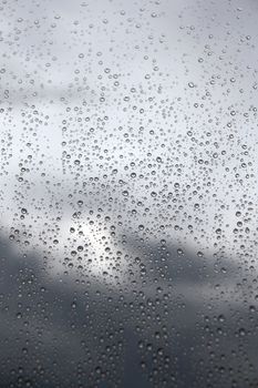 Drops of rain on the window (glass). Shallow DOF.