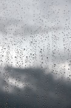 Drops of rain on the window (glass). Shallow DOF.