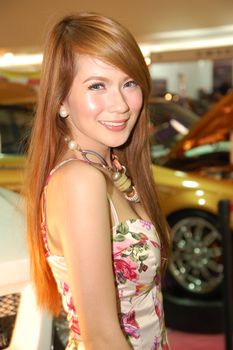 MANDALUYONG, PH - APR. 19: Car show female model at Trans Sport Show on April 19, 2012 in Megatrade Hall, Mandaluyong, Philippines.