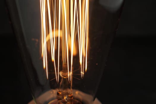 Edison retro lamp close-up. A good idea. High quality photo