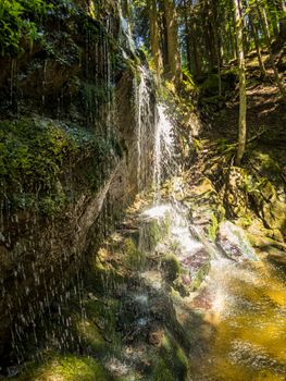 Hike to the Speckbach waterfall near Hellengerst in the Allgau