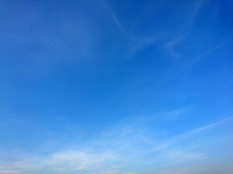 Background of blue sky with white cloud