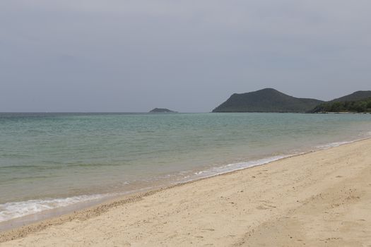 Sea soft wave and sand beach