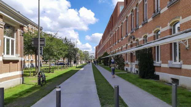 Antwerp, Belgium, July 2020: View on the Artsen Zonder Grenzenstraat in Groen Kwartier, formerly military hospital and now renovated residential area.