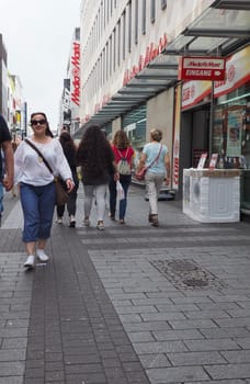 KOELN, GERMANY - CIRCA AUGUST 2019: People in Hohe Strasse (meaning High Street) shopping street