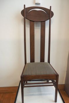 GLASGOW, UK - CIRCA JUNE 2018: Chair designed by Charles Rennie Mackintosh at the Lighthouse Scotland Centre for Design and Architecture