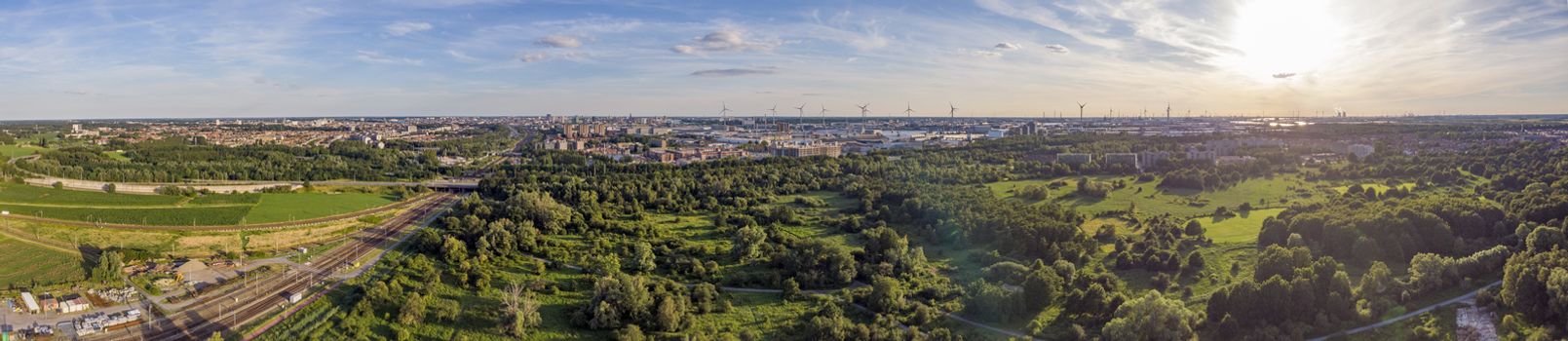 View on Antwerp North area, with city and harbor in far distance, nature park oude landen in foreground. Travel and Tourism.