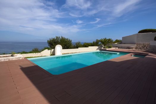 A small house with a swimming pool on the shores of the Mediterranean Sea. Accommodation in Spain.