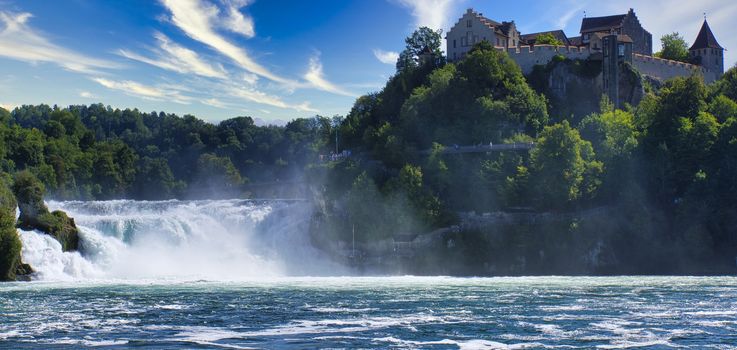 the famous rhine falls in the swiss near the city of Schaffhausen - sunny day and blue sky