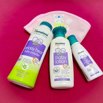 Chennai, India - July 4 2020: Baby Himalaya products placed beautifully in dark pink background and for smooth and soft skin