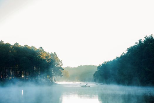 Mist in the morning with sunrise at Pang Oung reservoir.