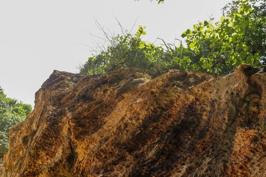 Suluban beach, Bali, Indonesia. Nature vacation background. Colorful sunrise on the rocky coast. Rocs on the beach. Blue ocean. Happy holiday. Vacation
