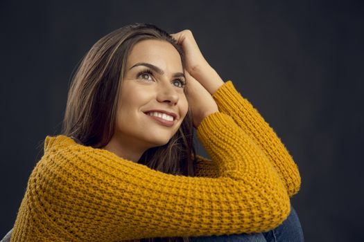 Shot of a beautiful young woman smiling to the camera and smiling