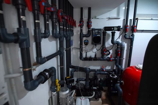 The boiler room in the house. Pipeline system in the home boiler room.