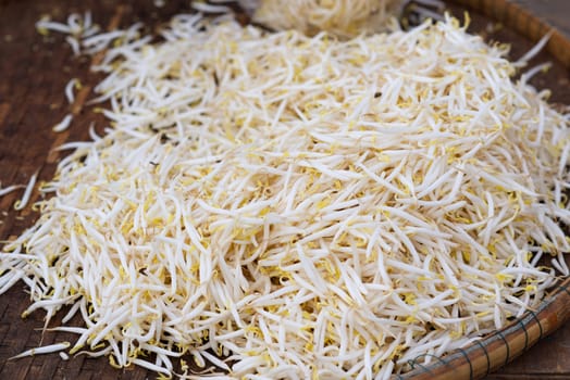 Fresh sprouts on a wooden basket For sale