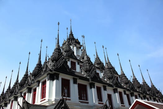 Wat Ratchanaddaram The top of the pagoda is made of metal.