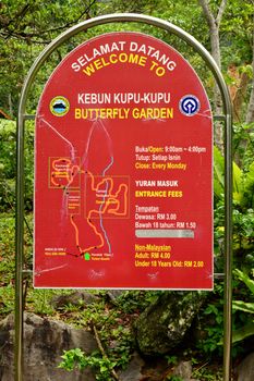 SABAH, MY - JUNE 18: Poring Hot Spring butterfly garden sign on June 18, 2016 in Sabah, Malaysia. Poring is situated in lowland rainforest, contrasting with the montane and submontane rainforest of Kinabalu National Park.