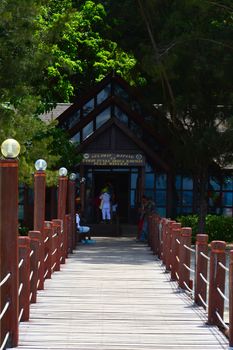 SABAH, MY - JUNE 20: Manukan Island footbridge on June 20, 2016 in Sabah, Malaysia. The Manukan Island Resort is a hideaway that is one of the five tropical islands that comprise the Tunku Abdul Rahman Park.