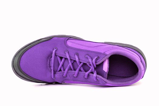 right cheap purple hiking or hunting shoe isolated on white background - view from above.