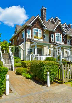 Residential townhouses on sunny day in Vancouver, British Columbia, Canada