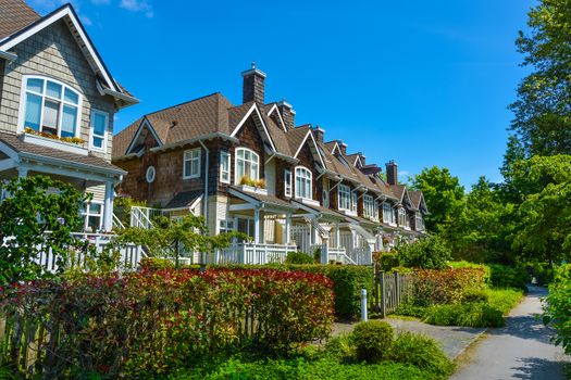 Residential townhouses on sunny day in Vancouver, British Columbia, Canada