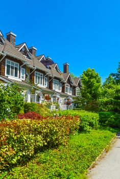 Residential townhouses on sunny day in Vancouver, British Columbia, Canada