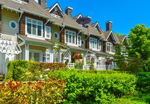 Residential townhouses on sunny day in Vancouver, British Columbia, Canada