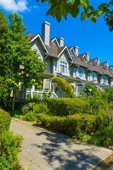 Residential townhouses on sunny day in Vancouver, British Columbia, Canada