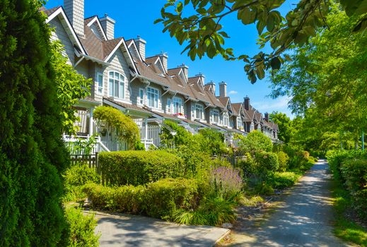 Residential townhouses on sunny day in Vancouver, British Columbia, Canada