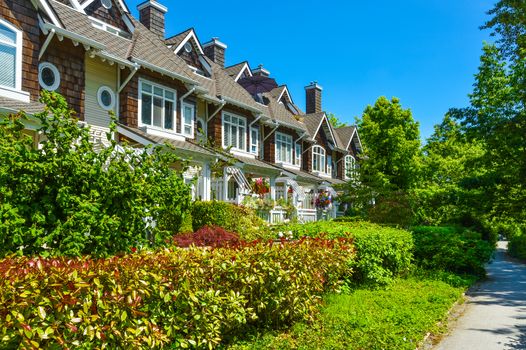 Residential townhouses on sunny day in Vancouver, British Columbia, Canada