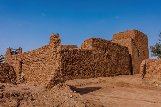 Restored traditional mud-brick buildings in Ushaiqer Heritage Village