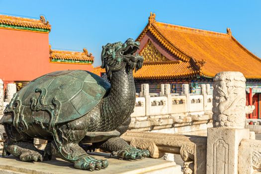 Bronze tortoise with a dragon head statue Baxia, in front of Palace of Heavenly Purity, Forbidden City, Beijing, China
