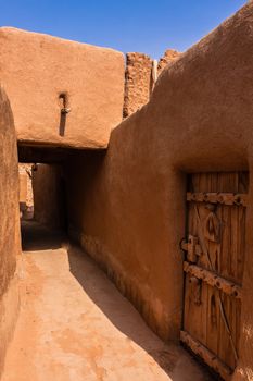 Restored traditional mud-brick buildings in Ushaiqer Heritage Village