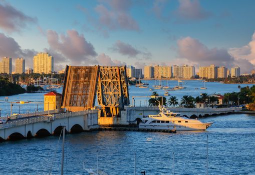 Luxury Yacht Passing Through an Open Drawbridge