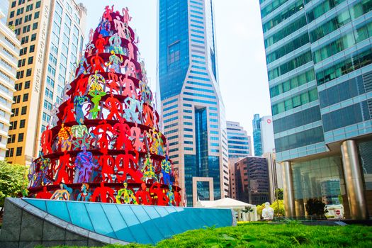 Singapore CBD, Singapore - June 21 2015: Singapore Momentum Sculpture located at the triangle traffic junction of Marina Blvd and Raffles Quay