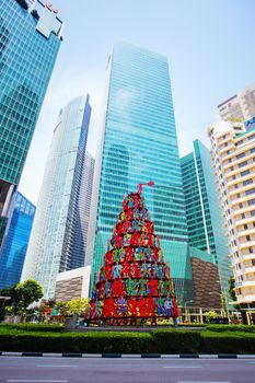 Singapore CBD, Singapore - June 21 2015: Singapore Momentum Sculpture located at the triangle traffic junction of Marina Blvd and Raffles Quay