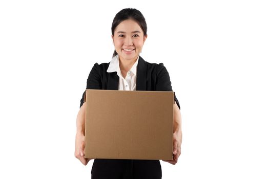 A young woman carrying a box