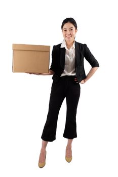 A young woman carrying a box