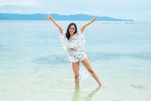 Happy girl on the beach