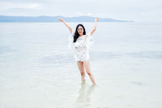 Happy girl on the beach 