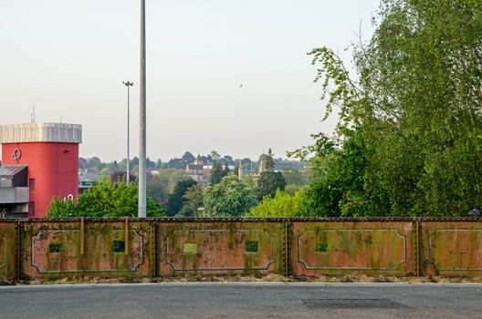 Loopholes cut into the bridge at Basingstoke railway station, Hampshire.  The holes were for gun positions as part of the Southen GHQ stop line running across England to defend against a Nazi invasion during World War 2.  