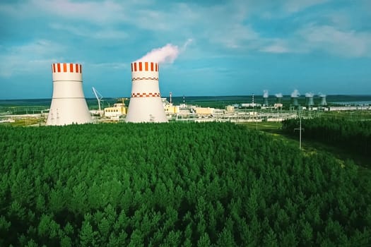 The cooling towers of power plants. Large cooling towers of the nuclear power plant.