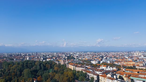 Turin, Italy - 07/02/2020: Travelling around North Italy. Beautiful caption of Turin wih sunny days and blue sky. Panoramic view to the city from Mole Antoneliana. Detailed photography of the old part